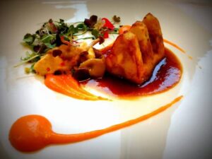 Tobleroneknödel de telera cordobesa y foie gras sobre una simbiosis de gelatinas (natural de rabo de toro y ecológica de Oloroso de Bodegas Robles).